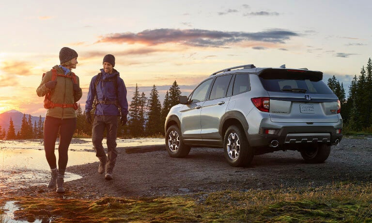 2022 Honda Passport parked in scenic area with hikers